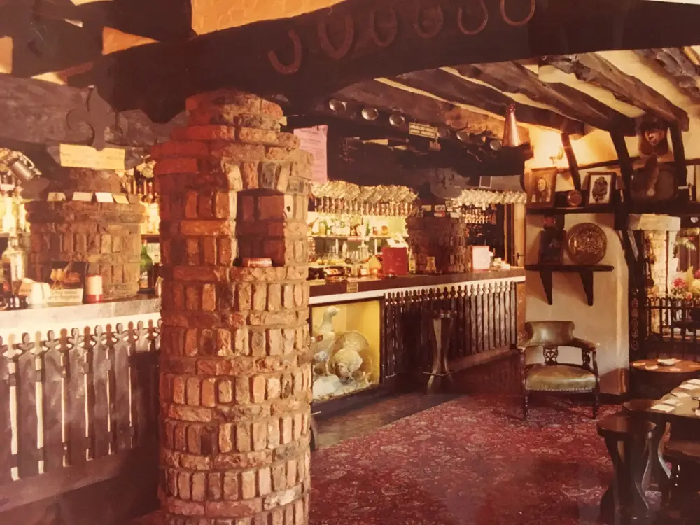 The brick pillar and lounge bar in the early years