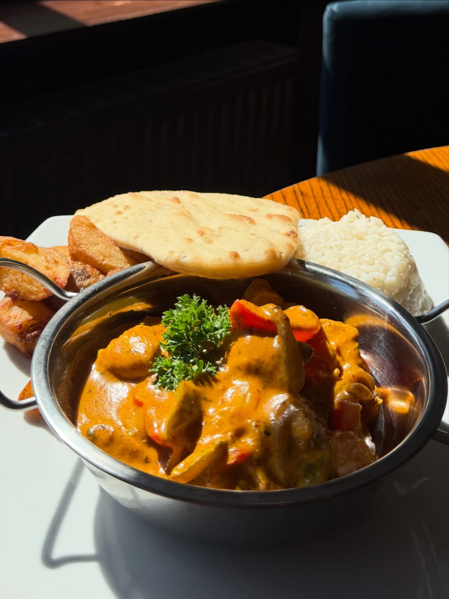 Curry with rice and naan bread at The Gamekeeper Scotter