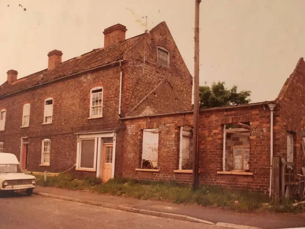 Early building work along the roadside