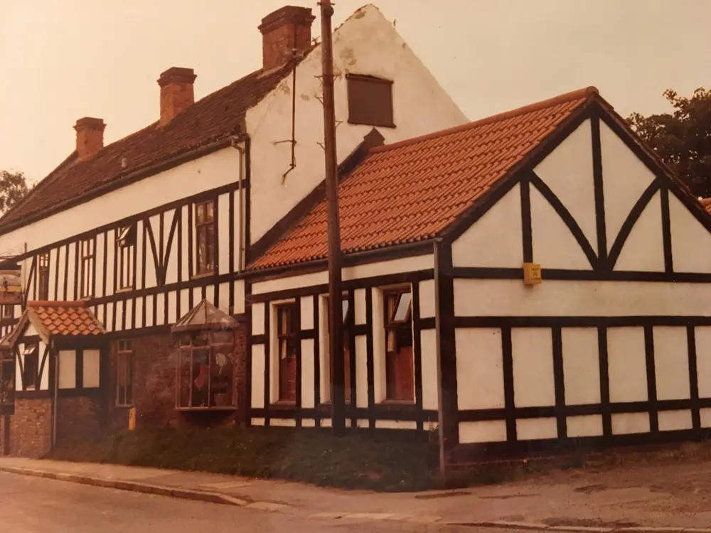 The finished black and white timbered exterior